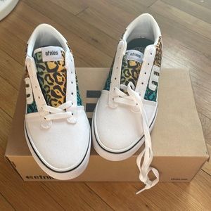 Etnies animal print fun tennis sneakers.  Casual wear.  Never worn.